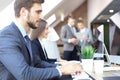 Young business people working on their desktop computers at the modern office space Royalty Free Stock Photo