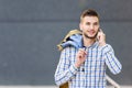 Young business traveler using cell phone Royalty Free Stock Photo