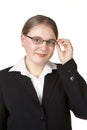 Young business woman adjusting glasses