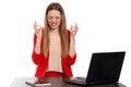 A young business woman against a white background isolated, working at home