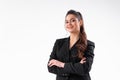 Young business woman arms crossed in black jacket standing studio isolated on white background Royalty Free Stock Photo