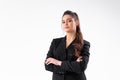 Young business woman arms crossed in black jacket standing studio isolated on white background Royalty Free Stock Photo