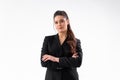 Young business woman arms crossed in black jacket standing studio isolated on white background Royalty Free Stock Photo