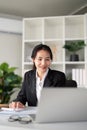 Young business woman asian or employee accounting bookkeeping documents checking financial data or marketing report Royalty Free Stock Photo