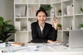 Young business woman asian or employee accounting bookkeeping documents checking financial data or marketing report Royalty Free Stock Photo