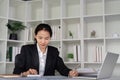 Young business woman asian or employee accounting bookkeeping documents checking financial data or marketing report Royalty Free Stock Photo