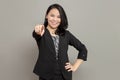 Young business woman in black suit pointing ahead with smiling Royalty Free Stock Photo