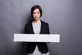 Young business woman with blank white board Royalty Free Stock Photo