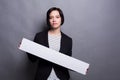 Young business woman with blank white board Royalty Free Stock Photo