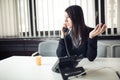 Young business woman calling and communicating with partners. Customer service representative on the phone Royalty Free Stock Photo