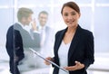 Young business woman with clipboard Royalty Free Stock Photo