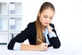 Young business woman doing some paperwork Royalty Free Stock Photo