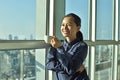 Young business woman drinking coffee in office Royalty Free Stock Photo