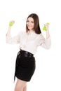 Young business woman in formalwear lifts dumbbells Royalty Free Stock Photo