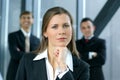 A young business woman in front of her colleagues Royalty Free Stock Photo