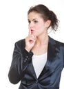 Young business woman gesturing silence sign, isolated Royalty Free Stock Photo