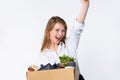 Young business woman glad to get a new job, gesturing - yes, with raised hand, thinking about future opportunities that following Royalty Free Stock Photo