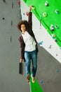 Young business woman hanging at wall, beautiful girl Royalty Free Stock Photo