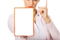 Young business woman holding a board with ban Royalty Free Stock Photo