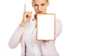 Young business woman holding a board with ban Royalty Free Stock Photo