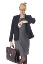 Young Business Woman Holding a Briefcase Looking at Watch Royalty Free Stock Photo