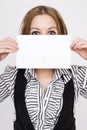 Young business woman holding empty white board Royalty Free Stock Photo