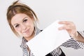 Young business woman holding empty white board Royalty Free Stock Photo