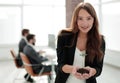 Young business woman holding a fresh sprout Royalty Free Stock Photo