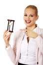 Young business woman holding hourglass.Time concept Royalty Free Stock Photo