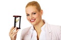 Young business woman holding hourglass.Time concept Royalty Free Stock Photo