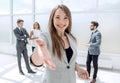 Young business woman holding out her hand for a handshake Royalty Free Stock Photo