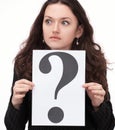 Young business woman holding a question mark. Royalty Free Stock Photo