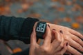 Young business woman is late on time, in a hurry she checks the deadline on her smart watch Royalty Free Stock Photo