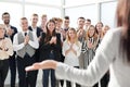 young business woman looking at her business team. Royalty Free Stock Photo