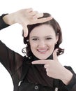 Young business woman making a picture frame from her hands. Royalty Free Stock Photo