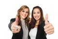 Young business woman making thumbs up gesture wearing blouse and Royalty Free Stock Photo