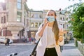 Young business woman in medical protective mask talking on smartphone Royalty Free Stock Photo