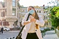 Young business woman in medical protective mask talking on smartphone Royalty Free Stock Photo