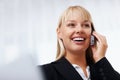 Young business woman on mobile. Closeup of business woman talking on cell phone. Royalty Free Stock Photo