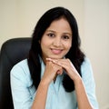 Young business woman at office