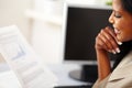 Young business woman reading documents Royalty Free Stock Photo