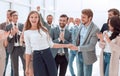 Young business woman shaking hands with her colleague Royalty Free Stock Photo