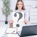 Young business woman showing a question mark, Royalty Free Stock Photo