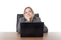 Young business woman sitting a her desk Royalty Free Stock Photo