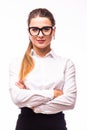 young business woman smiling, standing with arms crossed over white background Royalty Free Stock Photo