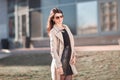 Young business woman standing on the street near the office building Royalty Free Stock Photo