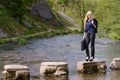 Young business woman stepping stones to success metaphor Royalty Free Stock Photo