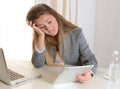 Young Business Woman stressed at work Royalty Free Stock Photo