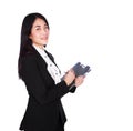 Business woman in suit writing on a clipboard isolated on white Royalty Free Stock Photo