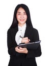 Business woman in suit writing on a clipboard isolated on white Royalty Free Stock Photo